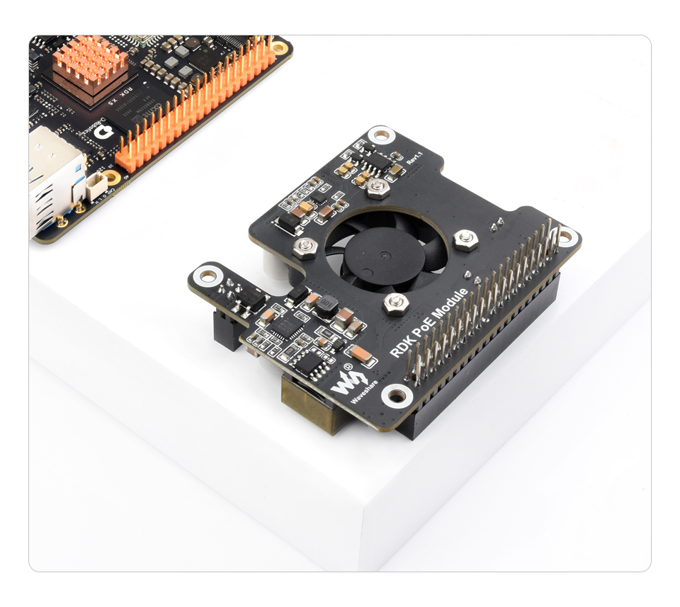 RDK-PoE-Module placed on a white background desktop