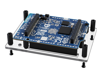 Installing nylon standoffs onto the four corner holes in top PC plate of Arduino UNO Q case