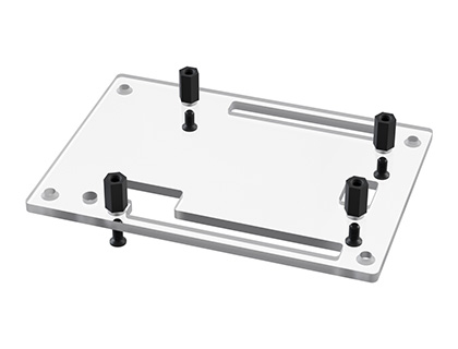 Nylon standoffs positioned over the inner mounting holes in the top plate